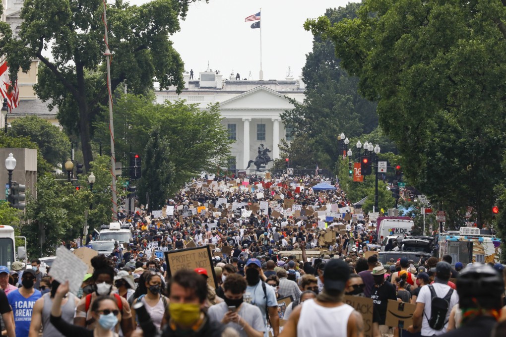 Demonstrators protest on Saturday near the White House in Washington. Photo: AP