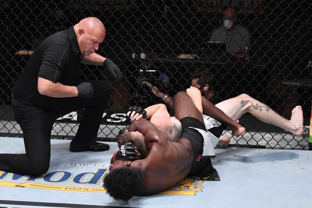 Aljamain Sterling attempts to secure a rear-naked choke submission against Cory Sandhagen in their bantamweight bout during UFC 250. Photos: USA TODAY Sports