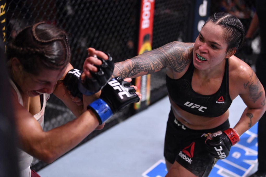 Amanda Nunes punches Felicia Spencer in their UFC featherweight championship bout during UFC 250. Photos: USA TODAY Sports