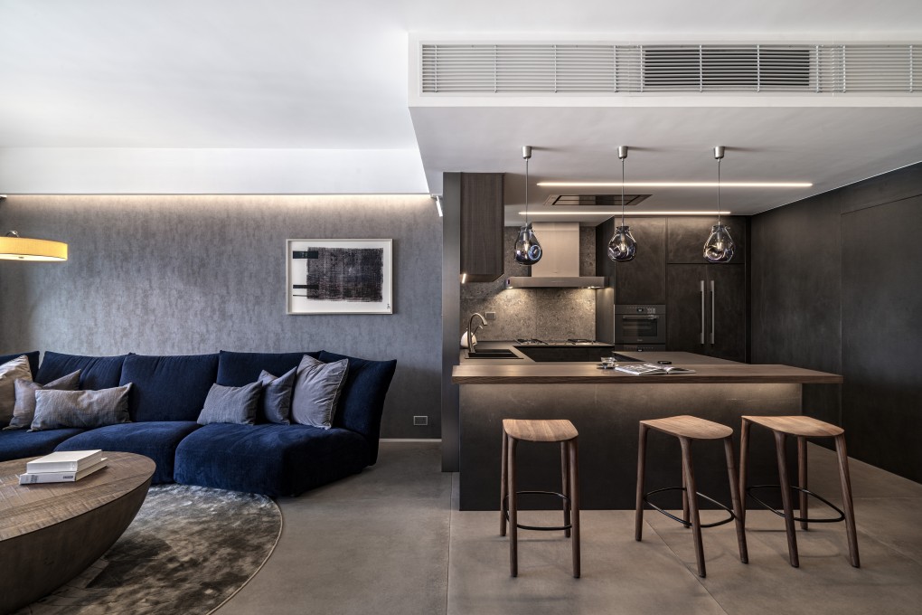 Materials add warmth and texture to this minimal Ho Man Tin home. Photo: Comodo Interior & Furniture Design