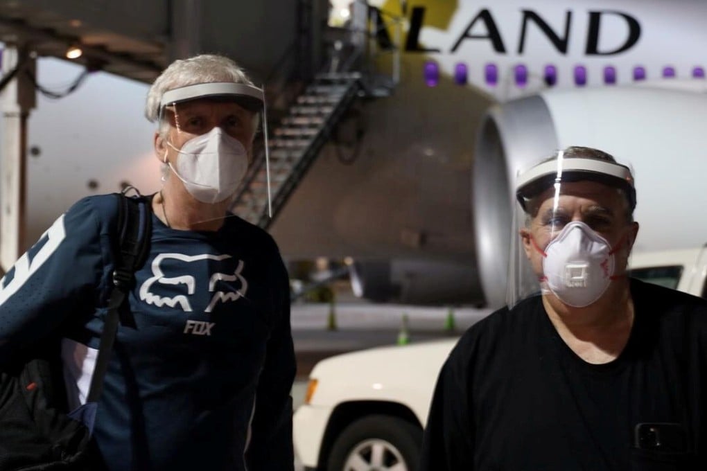 Canadian director James Cameron, left, and US producer Jon Landau land at Wellington International Airport on May 31, 2020. Photo: Lightstorm Entertainment via Reuters