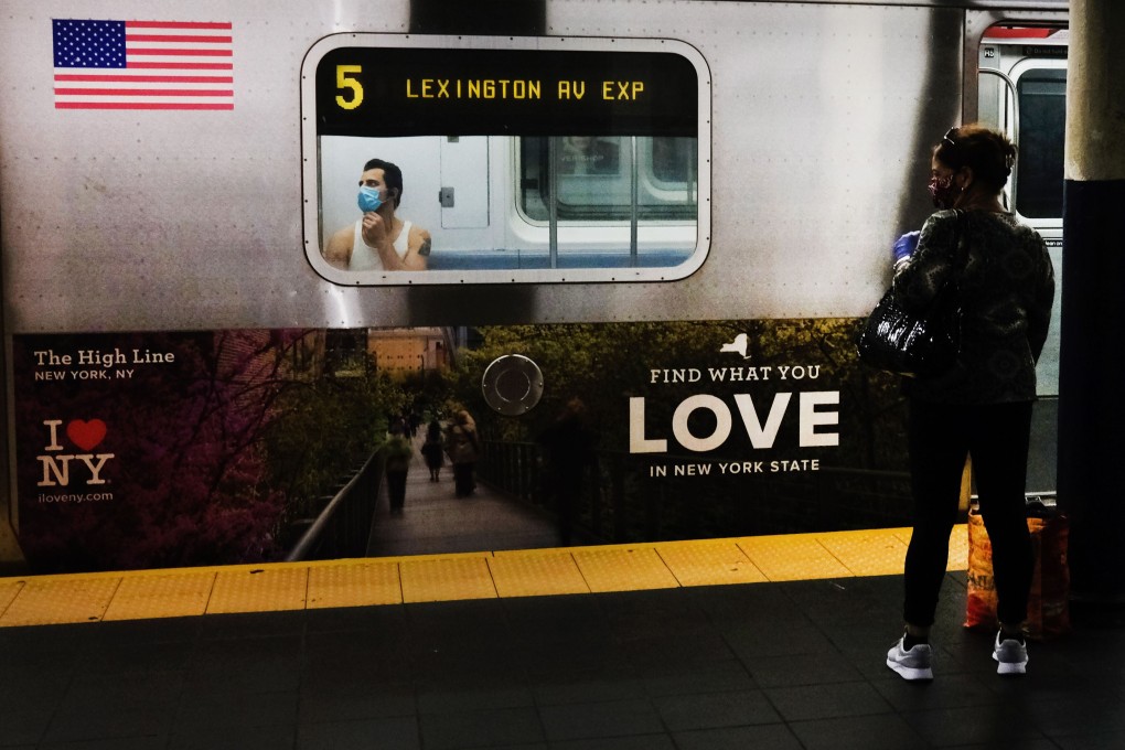 Commuters in New York City will find subway schedules back to usual Monday, with signs showing people how far apart to stand -or try to – on platforms. Photo: Bloomberg