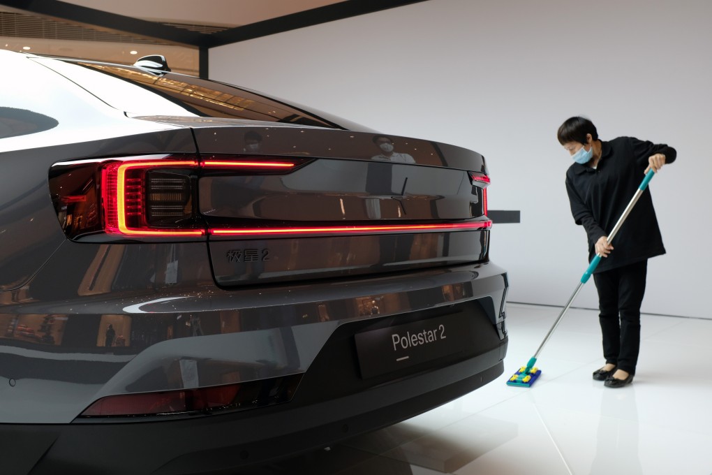 A Polestar 2 electric sedan is displayed at a shopping centre in Shanghai. The automobile sector has been boosted by supportive government policies aimed at the new energy vehicle segment. Photo: Reuters