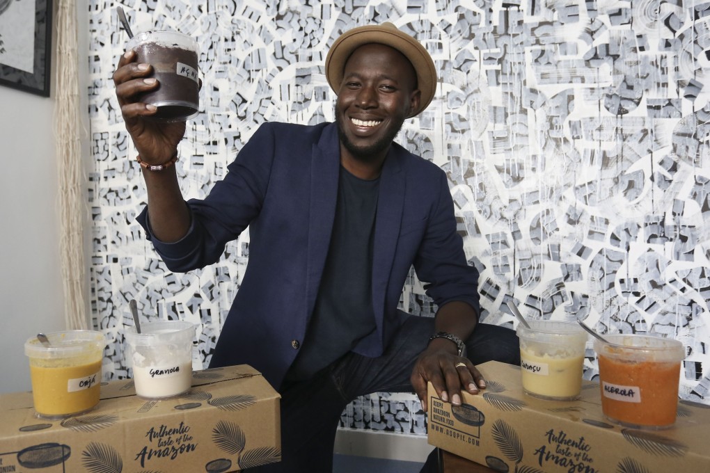 Wendell Paulus shows a selection of the Amazon superfoods that he is now importing to Hong Kong. Photo: Jonathan Wong