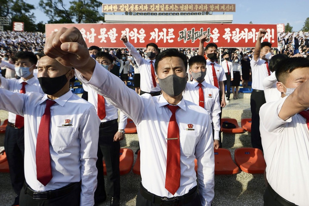 North Korean students take part in a rally denouncing “defectors from the North” in Pyongyang. Photo: Kyodo via Reuters