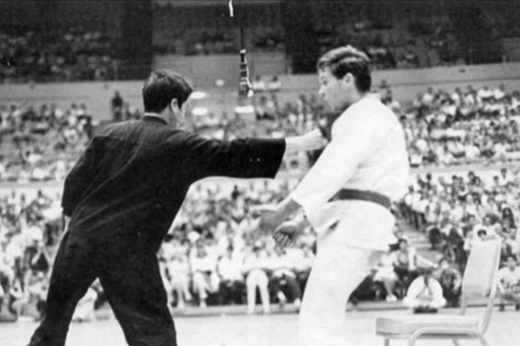 Bruce Lee shows his famous one-inch punch at the Long Beach International Karate Championships, 1964. Photo: Handout