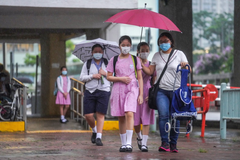 Hong Kong pupils continue return to school despite concerns over ...