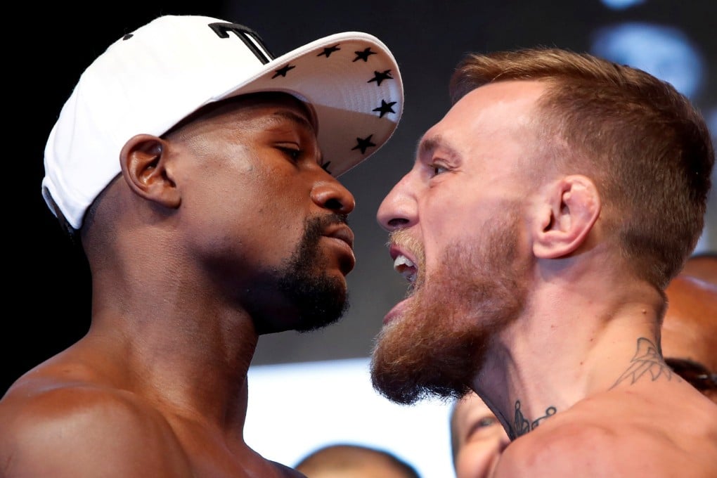 Undefeated boxer Floyd Mayweather Jnr and former UFC champion Conor McGregor face off at the official weigh-ins before their super fight at the T-Mobile Arena in Las Vegas, Nevada in 2017. Photo: Reuters