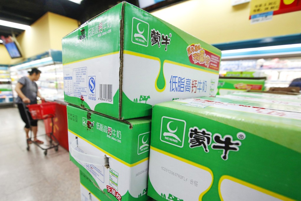 Boxes of Mengniu's milk products are seen at a supermarket in Beijing. Photo: Reuters