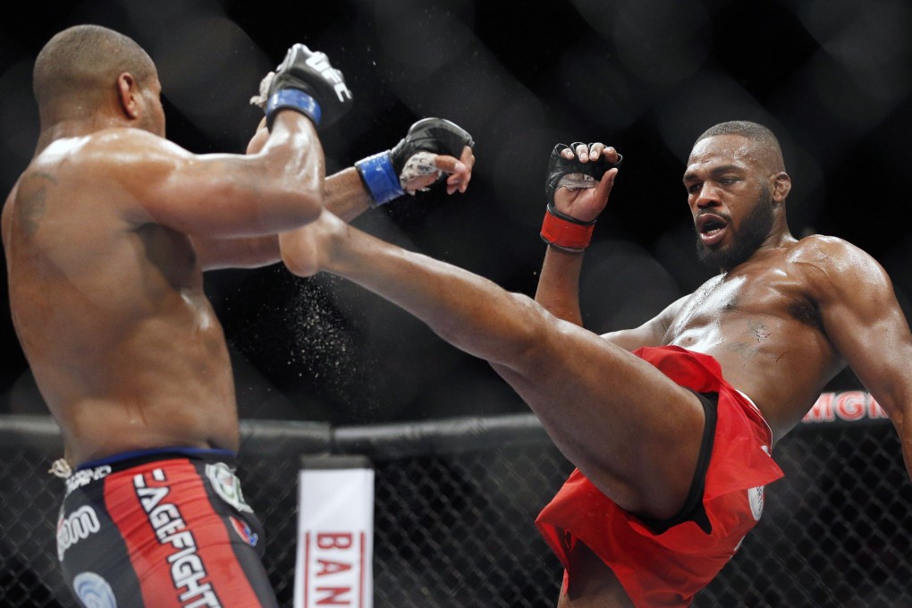 UFC light heavyweight champion Jon Jones front kicks former double champion Daniel Cormier in their light heavyweight title fight at UFC 182 in Las Vegas in 2015. Photo: AP