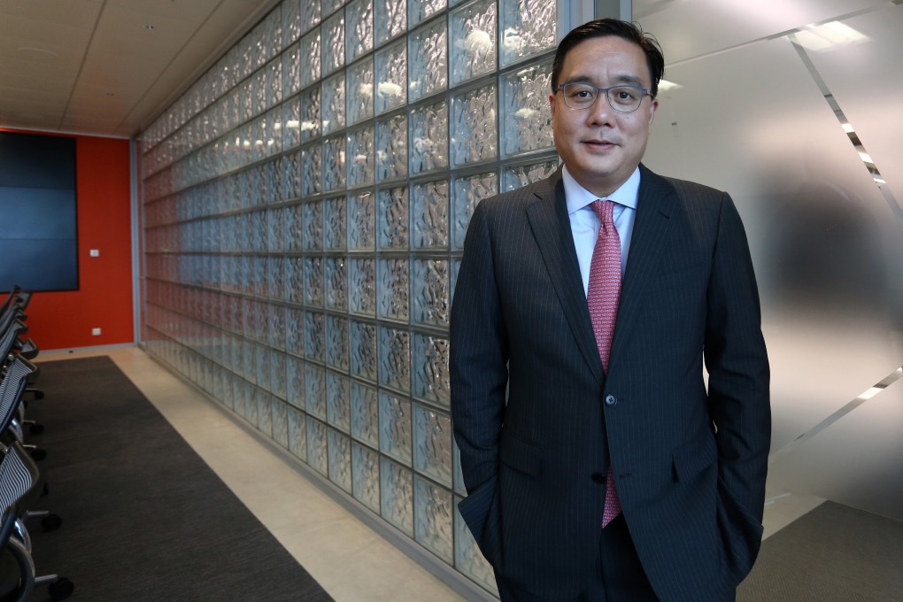 Terence Lam, head of sales & marketing for Asia at AXA Investment Managers, said Hong Kong will continue to remain an international financial centre despite recent crises. Photo: Jonathan Wong