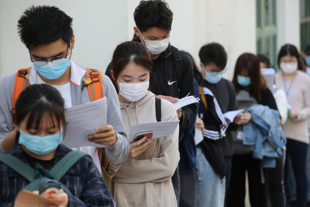 Secondary school students wait in line to sit the Diploma of Secondary Education exam at their centre in Shek Kip Mei on April 28. Photo: Winson Wong