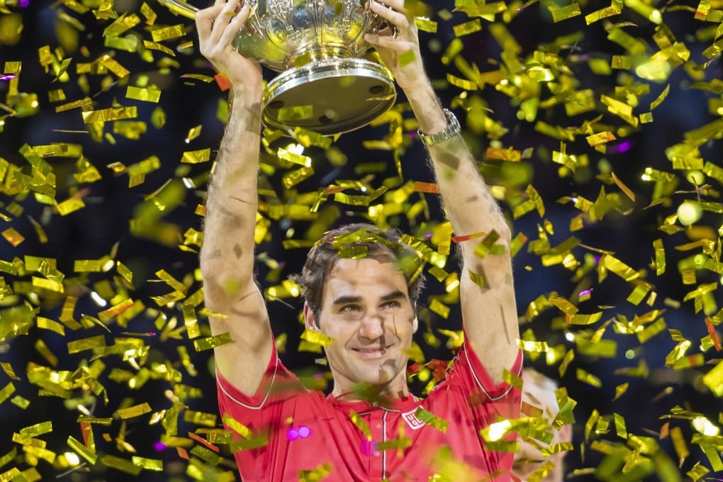 Switzerland's Roger Federer holds the trophy aloft after winning his tenth title at the 2019 Swiss Indoors tennis tournament in Basel, Switzerland. Photo: AP