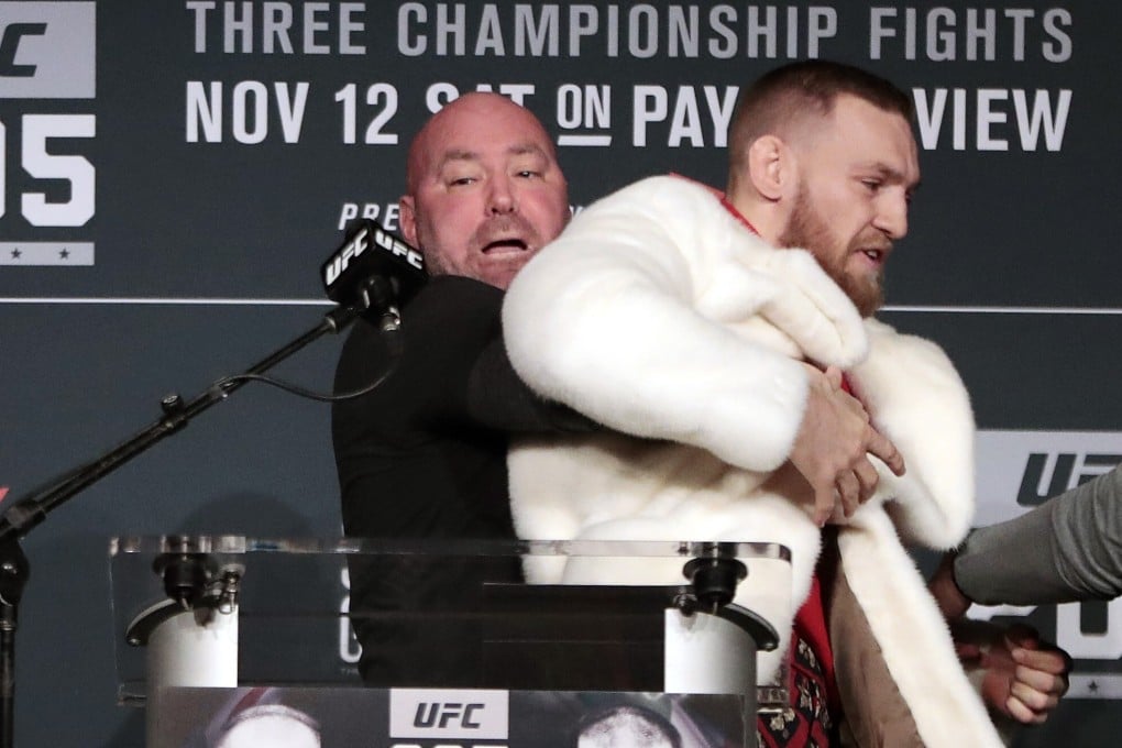 Conor McGregor is restrained by UFC president Dana White during a press conference before his fight against Eddie Alvarez at UFC 205 in Madison Square Garden, New York in 2016. Photo: AP
