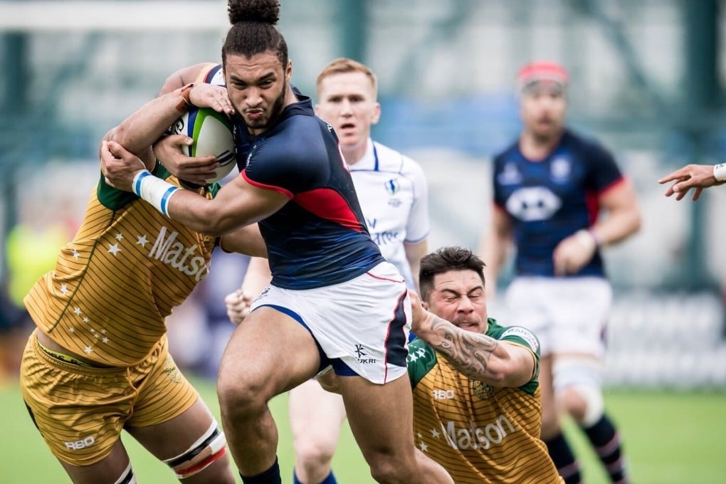 Max Denmark busts through against the Cook Islands, en route to the round robin tournament for the last 2019 Rugby World Cup spot. Photo: Handout