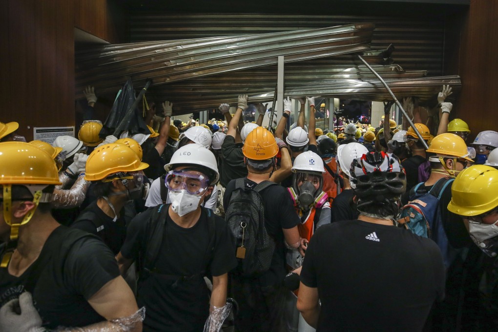 Protesters storm the Legislative Council on July 1 during a protest against the extradition bill on the 22nd anniversary of Hong Kong’s handover from Britain to China. Photo: Winson Wong