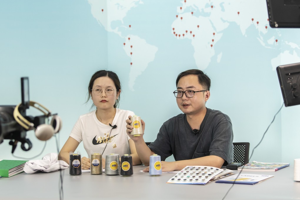 Anchors present yarn samples at a live-streaming video session rehearsal for the upcoming Canton Fair inside a showroom at Ningbo MH Industry Co in Ningbo, eastern Zhejiang province, on June 10. Photo: Bloomberg