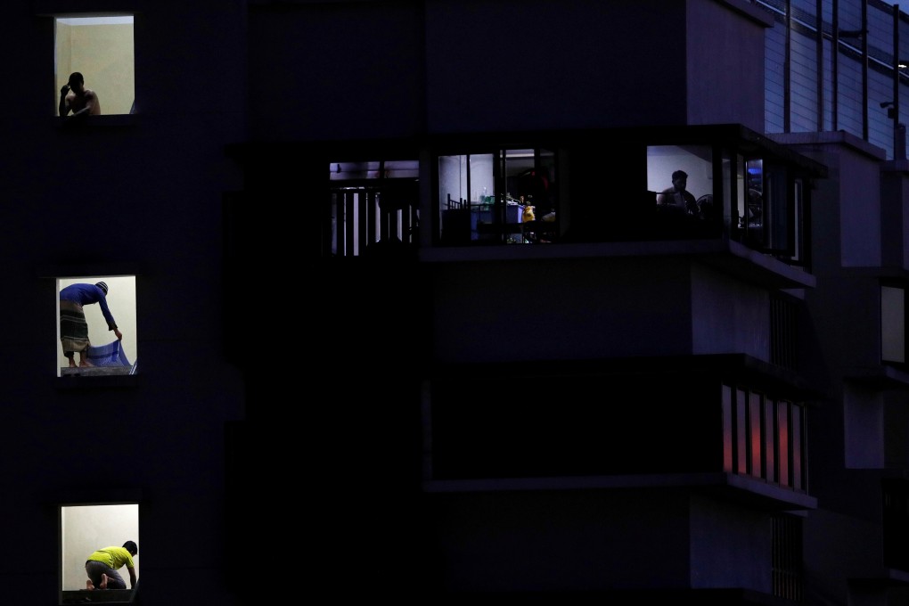 Migrant workers pictured in a dormitory in Singapore last month. Photo: Reuters