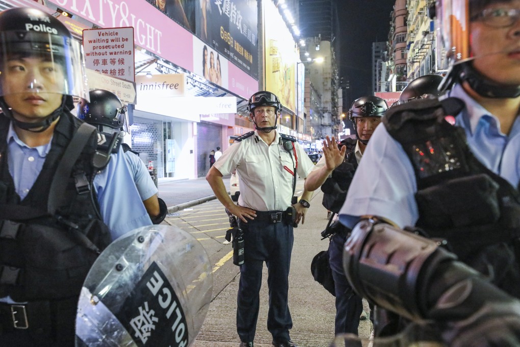 Assistant commissioner Rupert Dover in Mong Kok after a march against the extradition bill last July. Photo: Dickson Lee