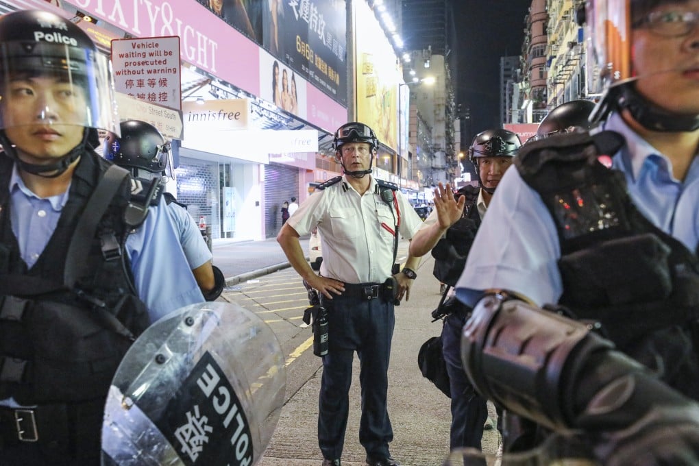 Assistant commissioner Rupert Dover in Mong Kok after a march against the extradition bill last July. Photo: Dickson Lee