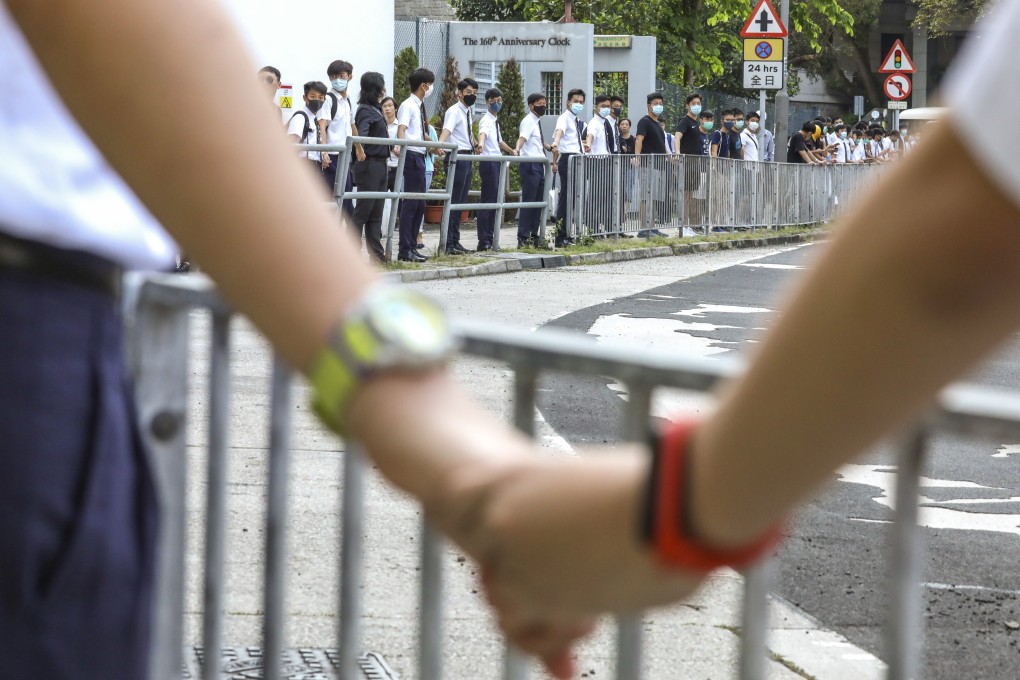 Pupils from schools in Mid-Levels form a human chain as part of last year’s anti-government protests. Photo: Nora Tam