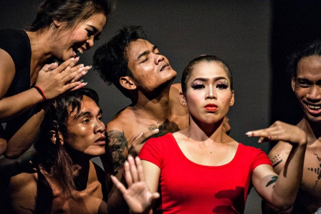 A Cambodian circus that takes its performers from the country’s poorest, and funds an arts school, is facing hard times during the Covid-19 pandemic. Nov Sreyleak (red) and other members of Phare. Photo: Phare