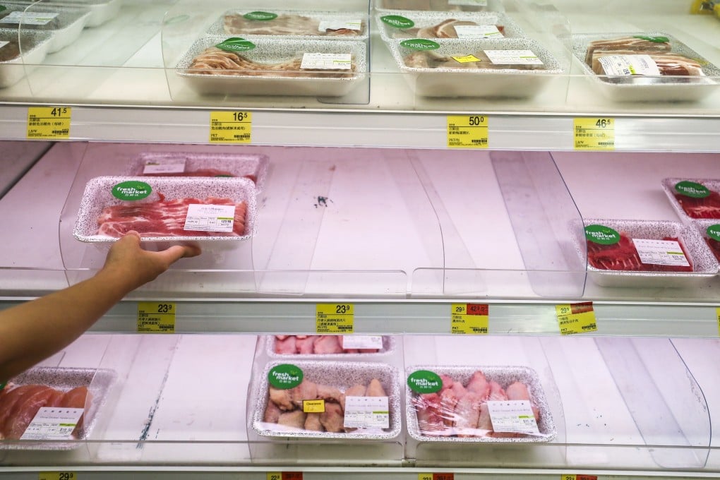 Many Hongkongers love to take products from the back of the shelf, believing products that are stocked at the front are usually closer to expiry dates. Photo: Winson Wong