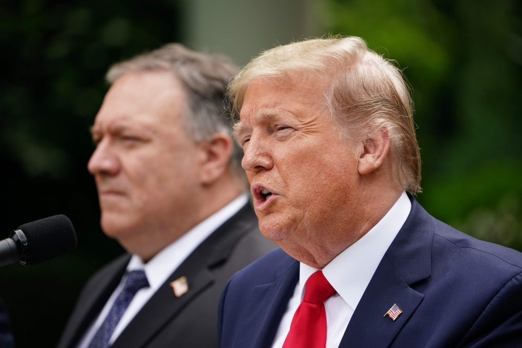 US President Donald Trump speaks at a press conference on China as Secretary of State Mike Pompeo listens in the Rose Garden of the White House on May 29. Photo: AFP
