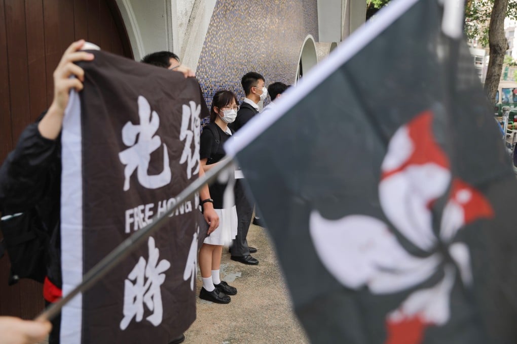 Pupils form a human chain at ELCHK Lutheran Secondary School and True Light Girls College. Photo: Sam Tsang