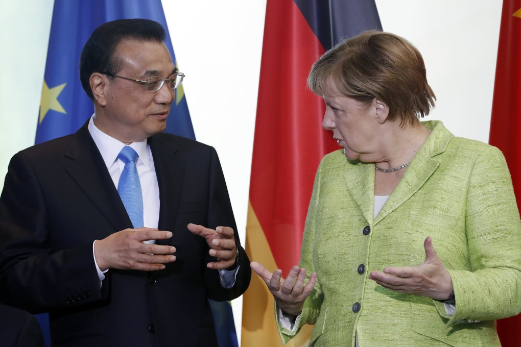 Angela Merket and Li Keqiang at a 2017 summit. Photo: EPA