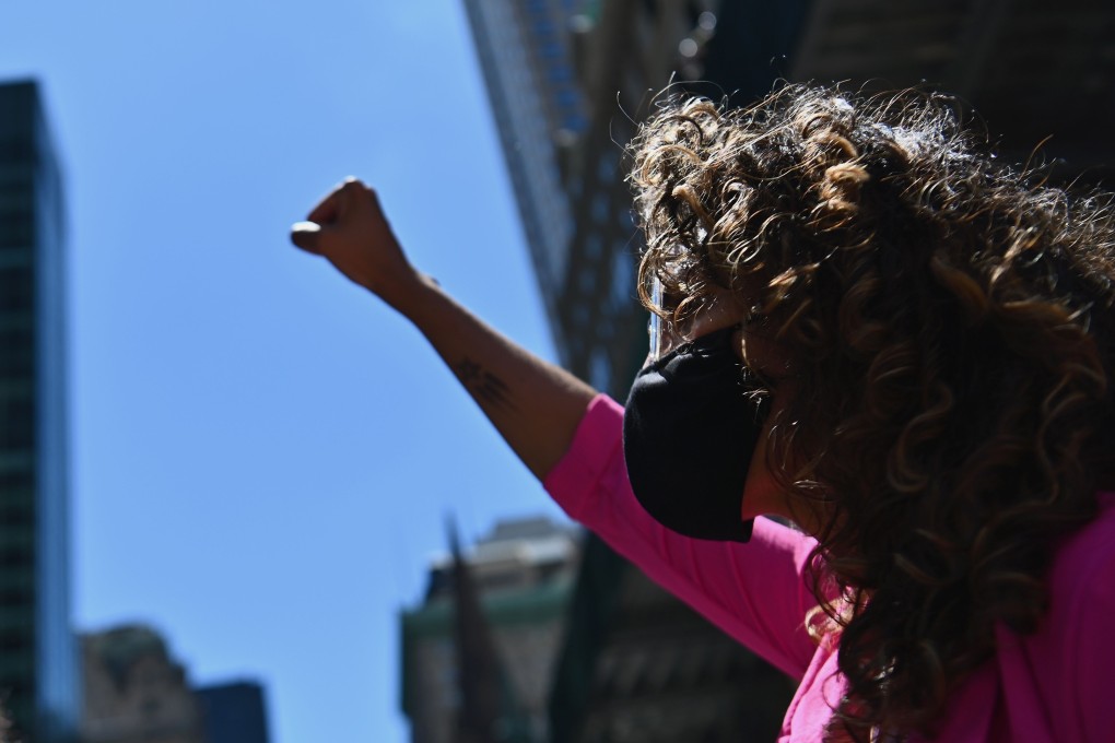 Demonstrators protest against police brutality and racial inequality in the aftermath over the death of George Floyd on 5th Avenue at Trump Tower. Photo: AFP
