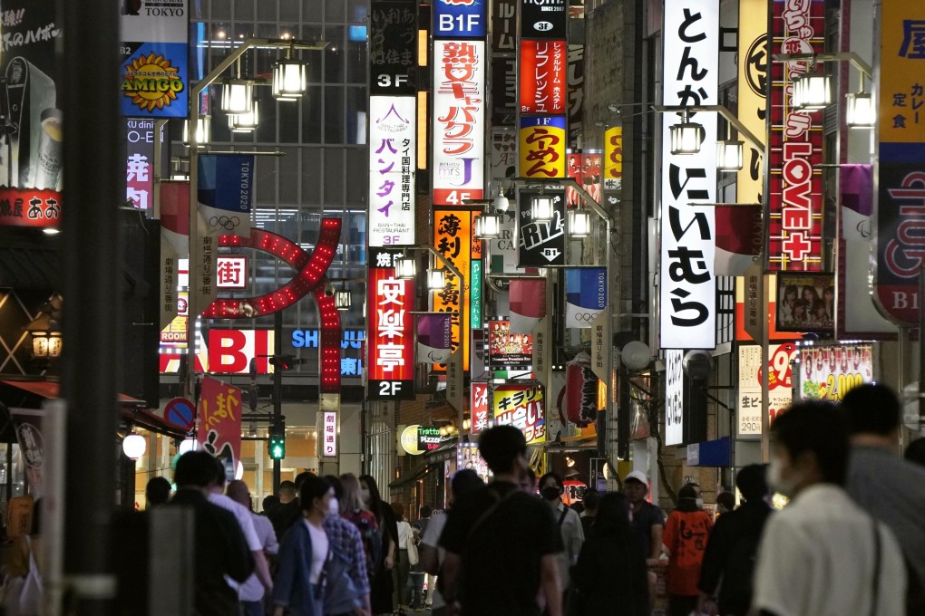 A street in Tokyo's Shinjuku area is crowded with people on Sunday, June 14. The metropolitan government confirmed that a number of new coronavirus infections were linked to the city’s nightlife district. Photo: Kyodo