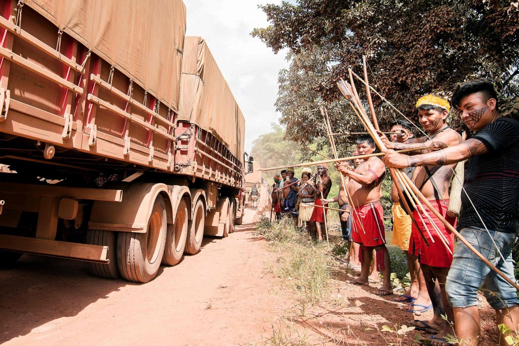 Indigenous people of the Munduruku tribe block a highway near Itaituba, Para State, north of Brazil. Photo: AFP