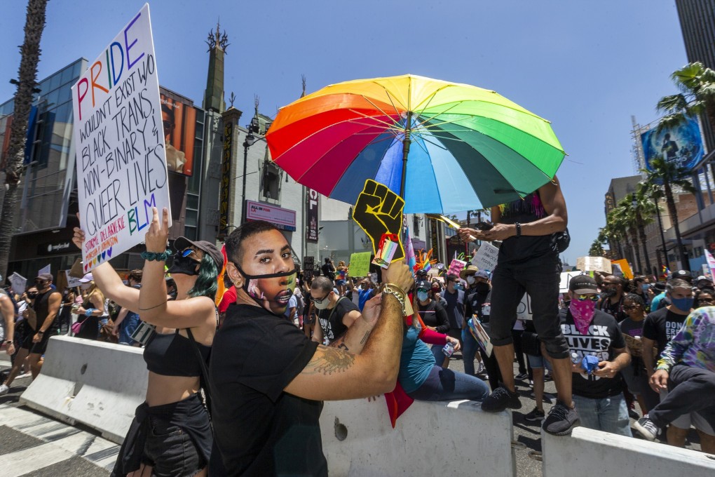 People take part in an “All Black Lives Matter” march organised by black members of the LGBT community in the Hollywood section of Los Angeles on Sunday. Photo: AP