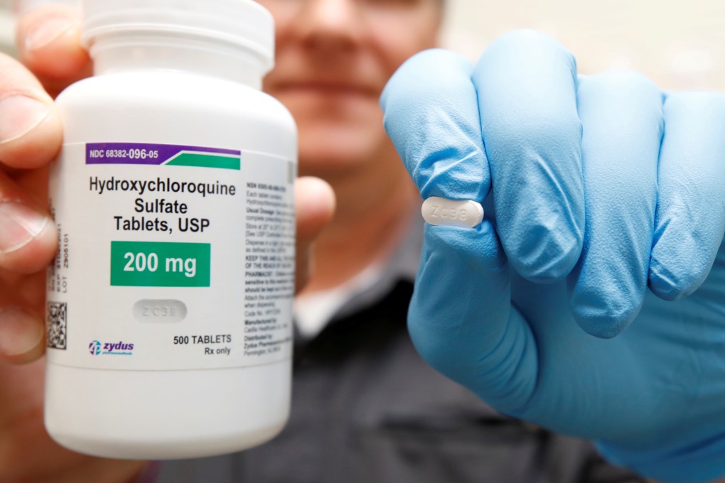 A pharmacist in Utah holds a bottle of hydroxychloroquine, the drug pushed by US President Donald Trump and others in recent months as a possible treatment for Covid-19. Photo: Reuters