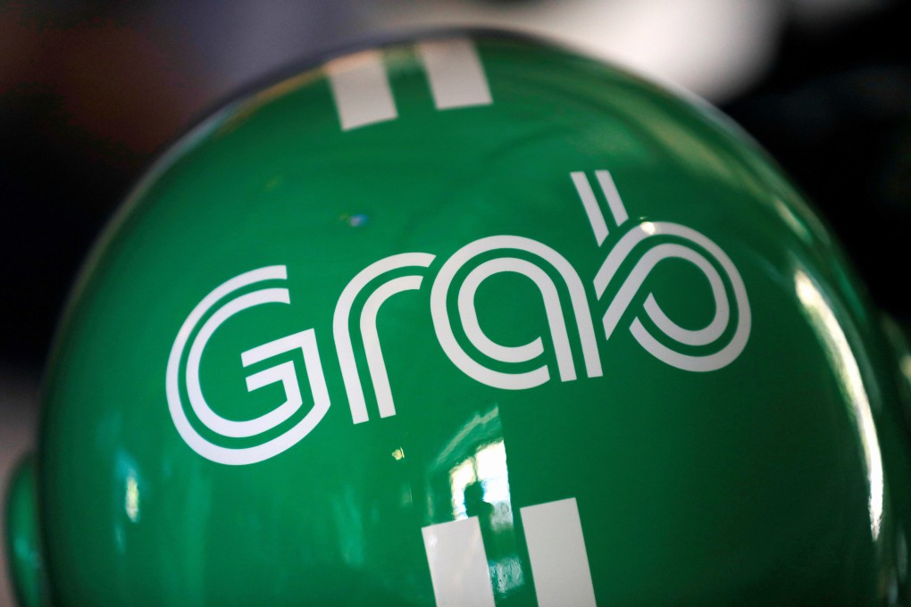 A Grab motorbike helmet is displayed during Grab's fifth anniversary news conference in Singapore, June 6, 2017. Photo: Reuters