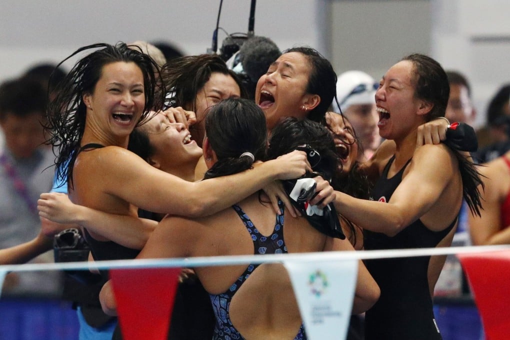 Hong Kong women’s medley relay team celebrate after capturing a silver medal at the 2018 Asian Games in Jakarta. Photo: Reuters
