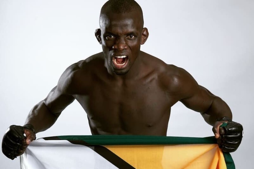 Themba Gorimbo shows off the Zimbabwe flag. Photo: Instagram