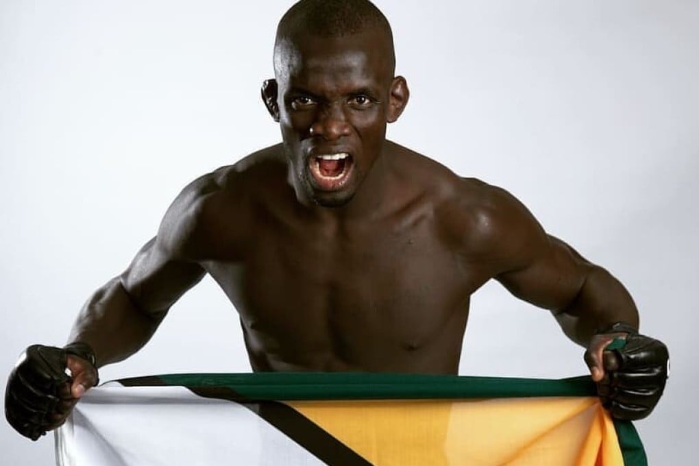 Themba Gorimbo shows off the Zimbabwe flag. Photo: Instagram