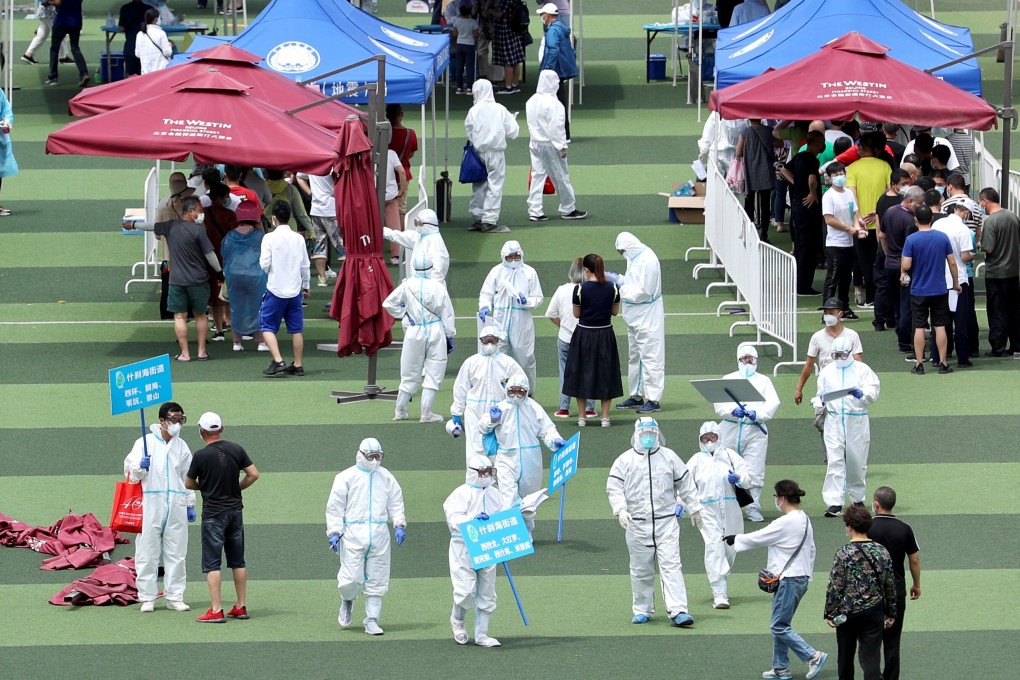Medical workers conduct tests in Beijing following a cluster of new infections in the city. Photo: Reuters