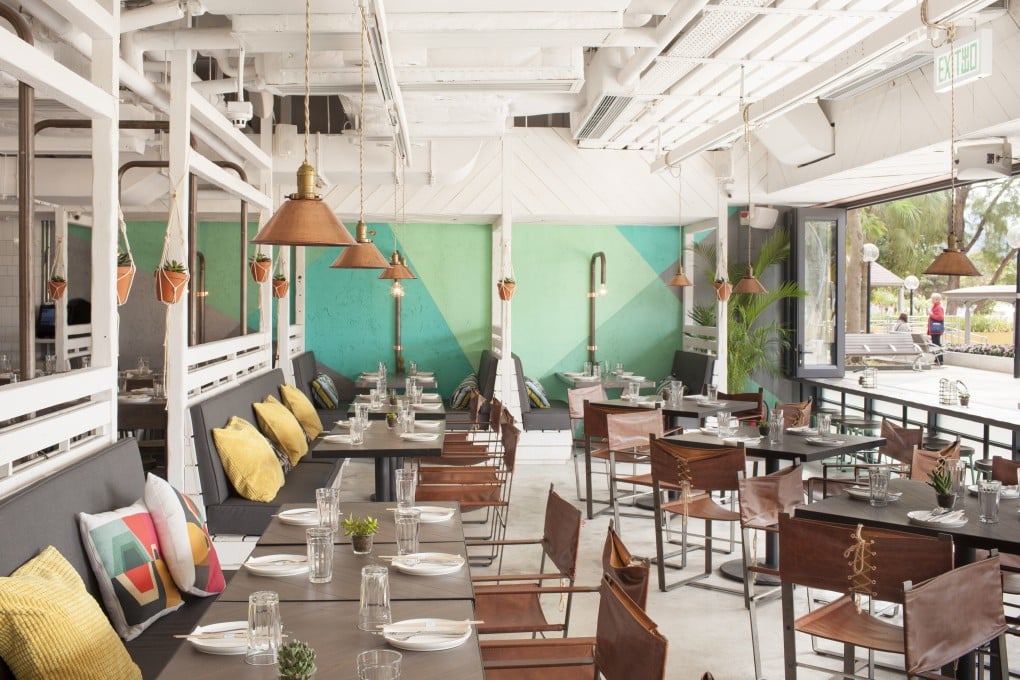 Limewood’s aqua walls and white wood add to the Repulse Bay restaurant’s relaxed, tropical vibe. Photos: Maximal Concept