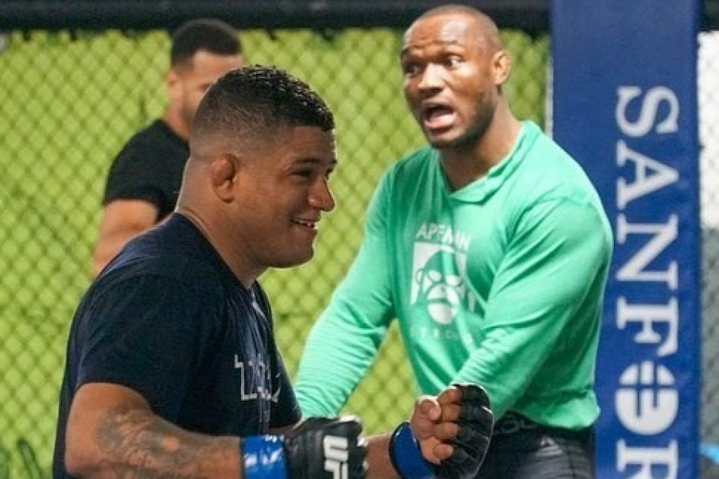 Kamaru Usman (right) leads Gilbert Burns and other Sanford MMA stars in a wrestling session in January. Photo: Instagram