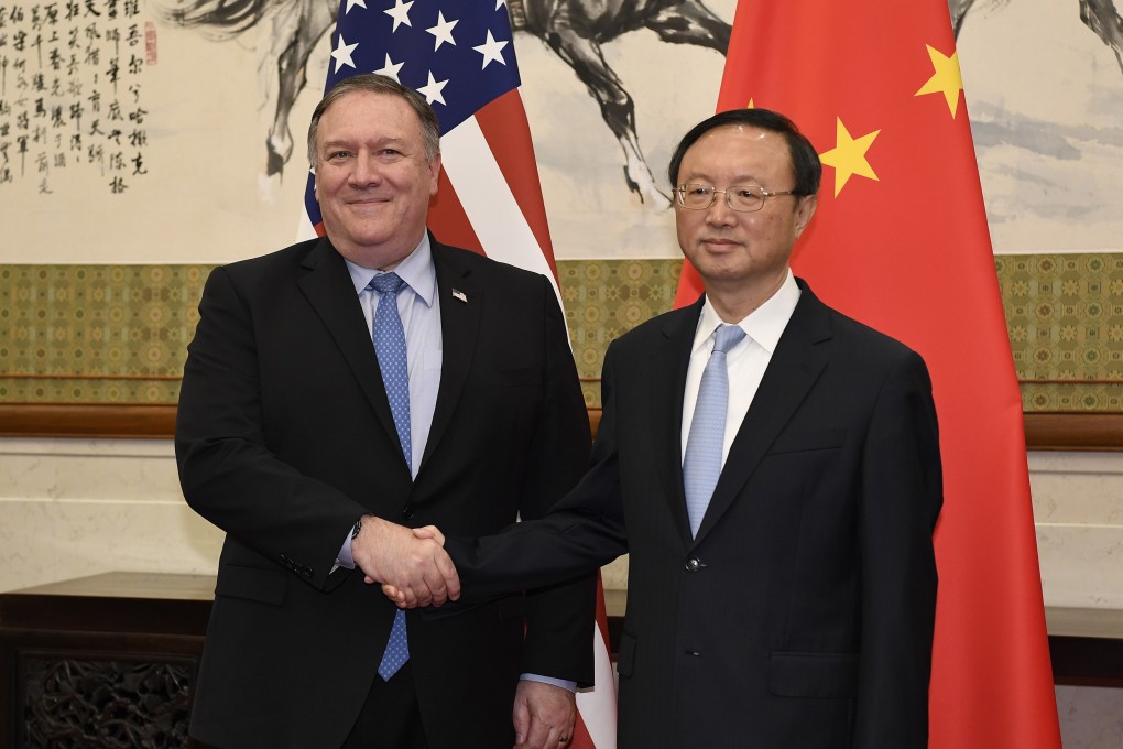 Secretary of State Mike Pompeo shakes hands with Yang Jiechi, a member of the Political Bureau of the Chinese Communist Party during their meeting in Beijing in October 2018. Photo: AP