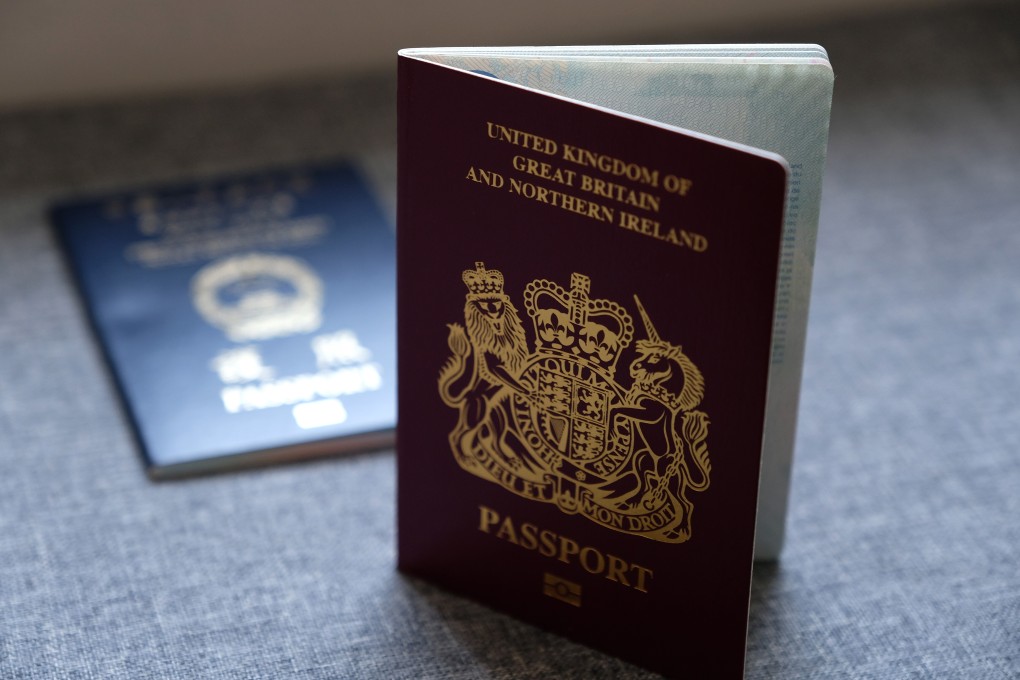 A British National (Overseas) passport (forefront) and an HKSAR passport. Photo: SCMP / Fung Chang