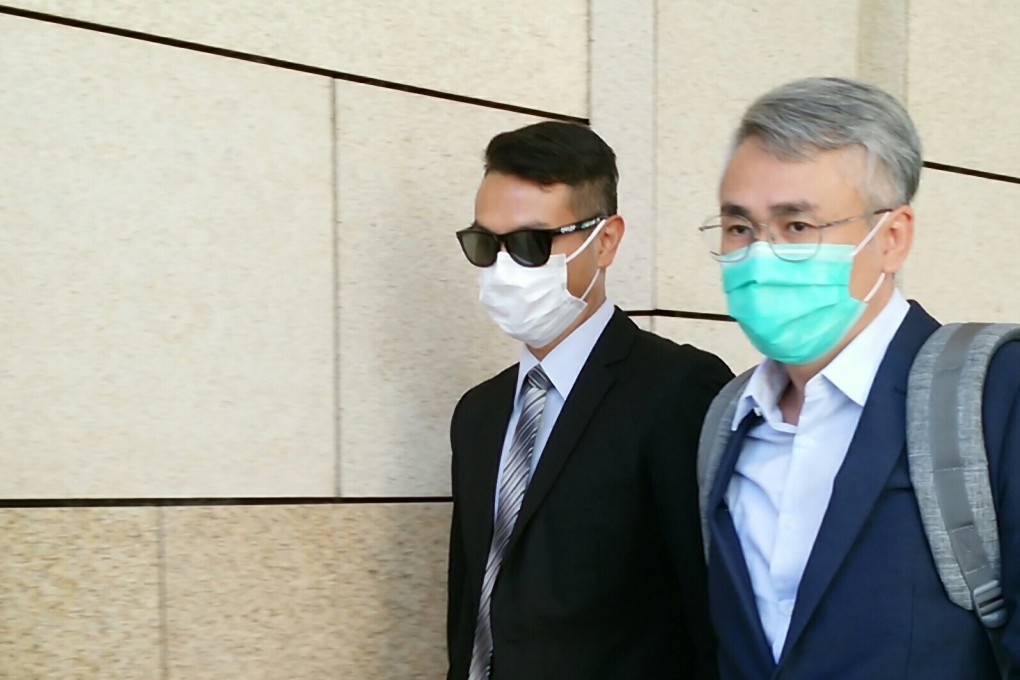 Police constable Ng Yat-kai (left) leaving the Coroner's Court. Photo: Brian Wong