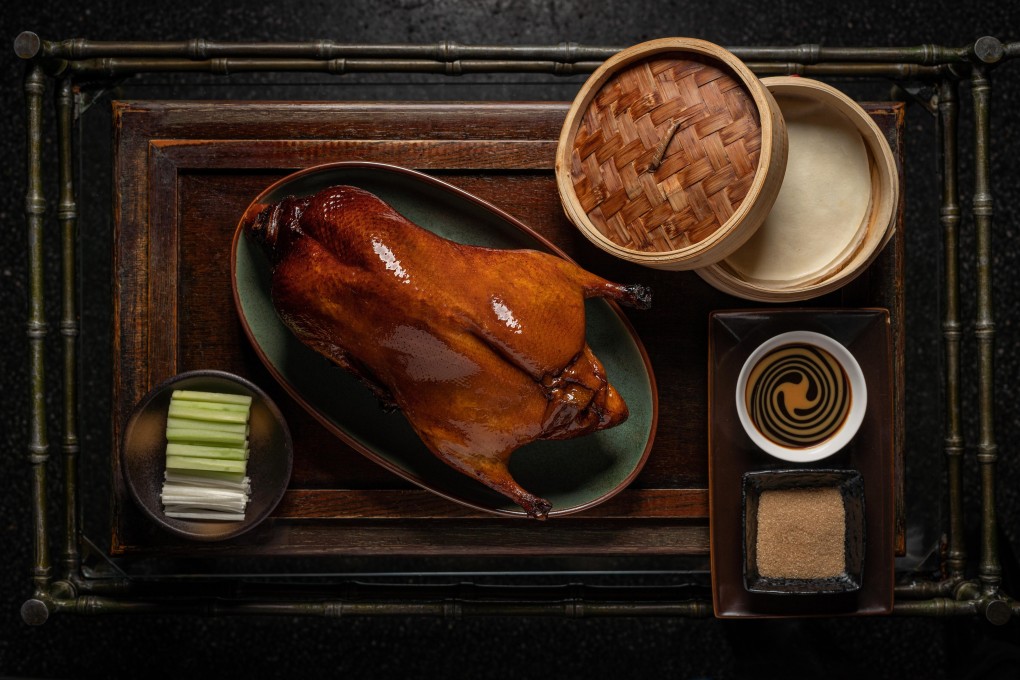 The applewood-roasted Peking duck at Mott 32. Photo: Maximal Concepts