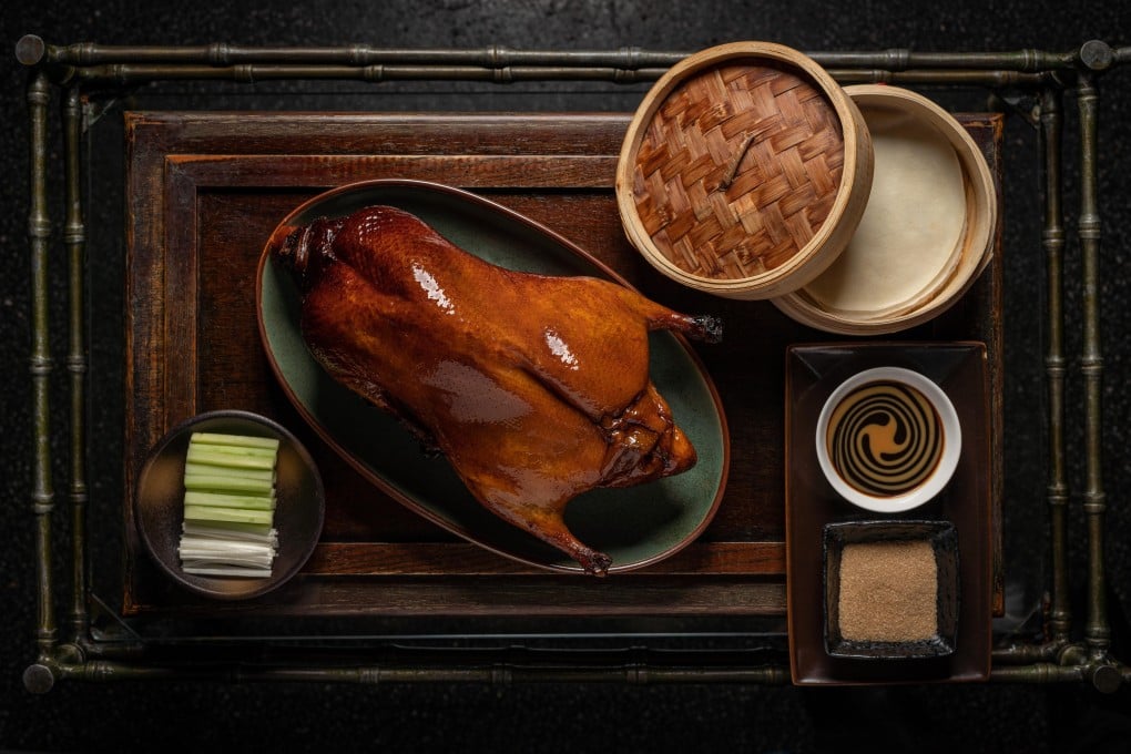 The applewood-roasted Peking duck at Mott 32. Photo: Maximal Concepts