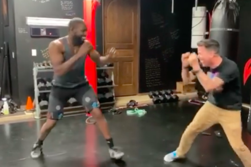 Jon Jones horses around with Steve-O on the mats at Jackson Wink MMA academy. Photo: Instagram