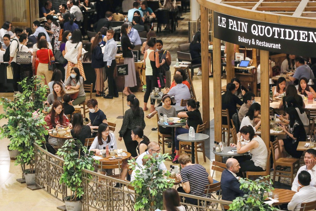 A restaurant at the Pacific Place mall is packed at lunchtime as social-distancing measures continue to relax in Hong Kong. Photo: May Tse