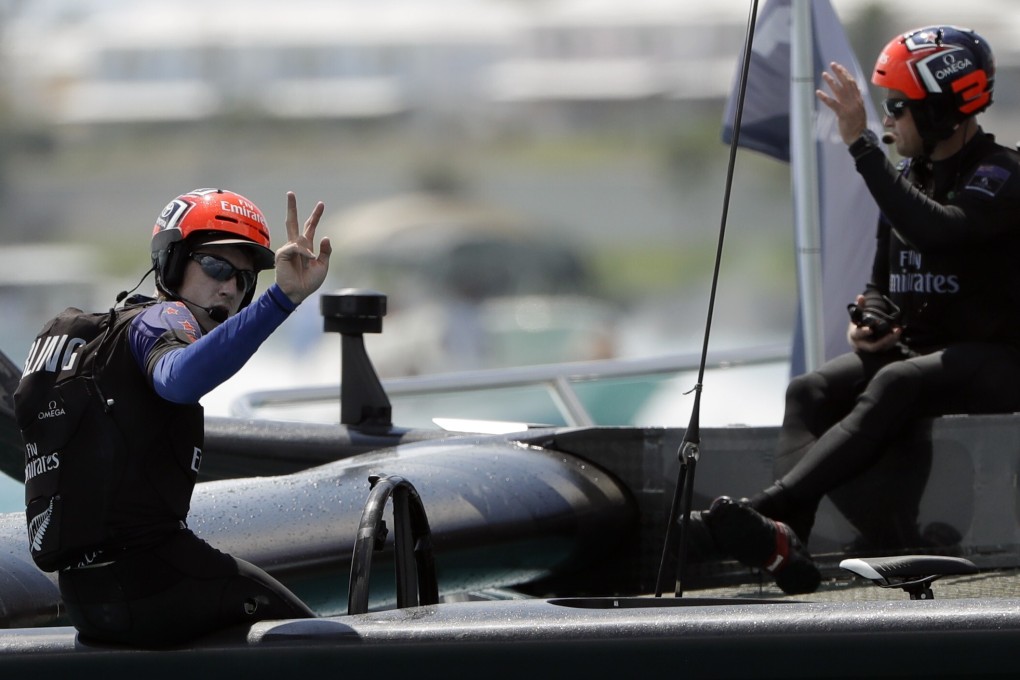 Peter Burling (left), helmsman for Emirates Team New Zealand, and skipper Glenn Ashby after winning the second race against Oracle Team USA during America’s Cup in 2017. Photo: Associated Press